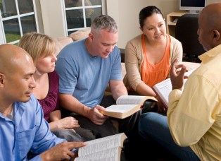Group of Christians reading the Bible